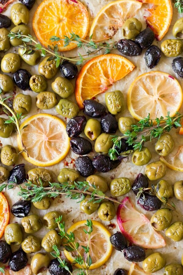 Roasted olives, oranges, lemons and herbs.