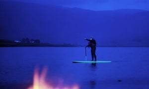 Kieran Meeke’s night-time paddleboarding on Loch Cloon in Kerry.