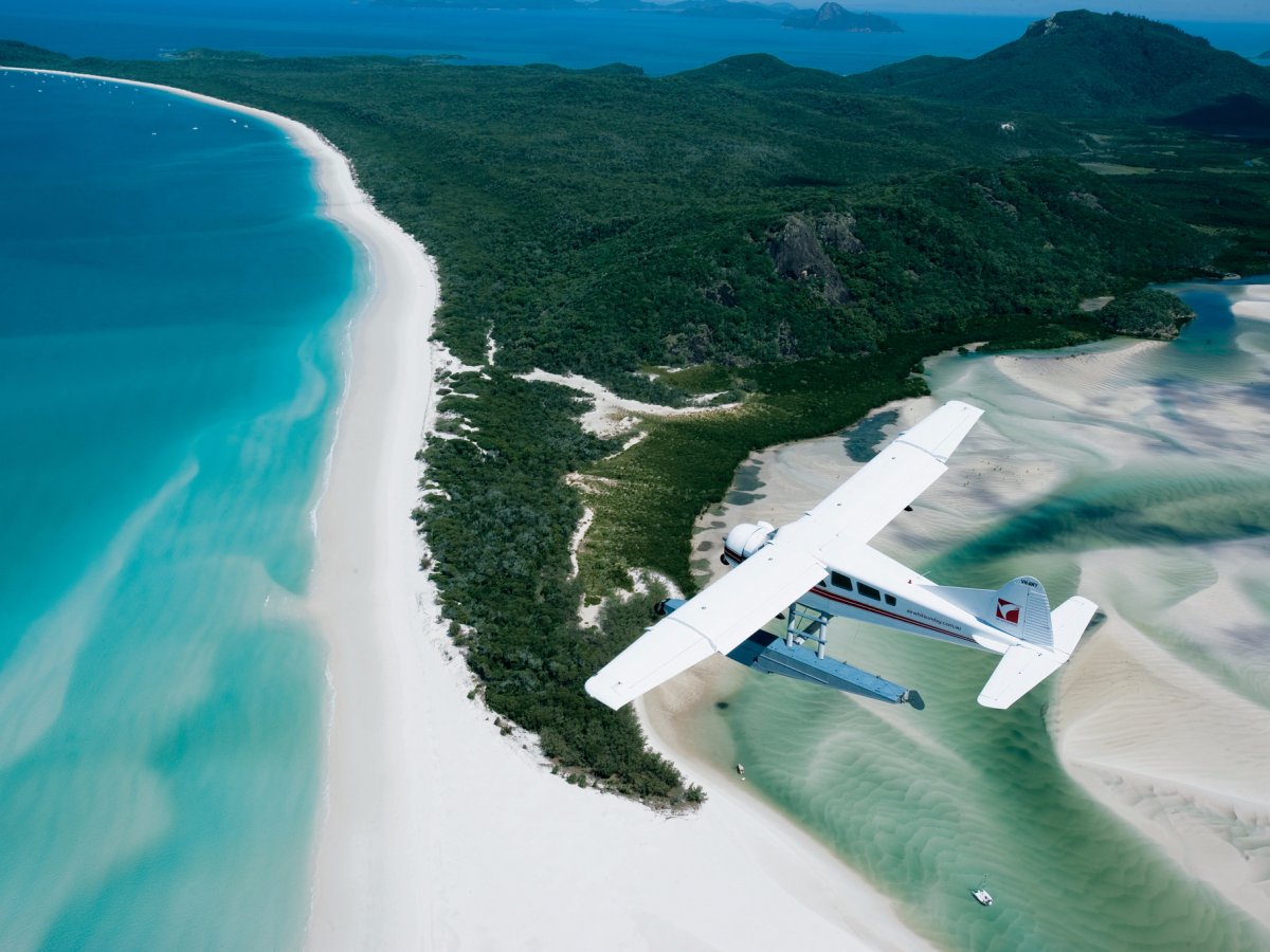 whitehaven-beach-in-whitsunday-island-australia-hosts-a-cove-where-the-tide-shifts-the-sand-and-waters-together-creating-a-breathtaking-combination-white-sands-and-turquoise-waters-seem-to-blend-seamlessly-to-make-for-a-marvelous-view