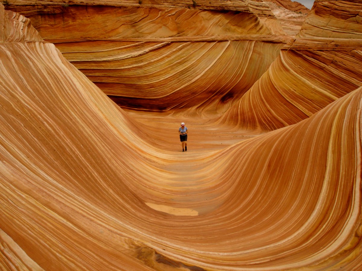 the-wave-is-a-sandstone-rock-formation-located-in-the-paria-canyon-vermillon-cliffs-wilderness-near-the-border-of-arizona-and-utah-its-known-for-its-colorful-and-unique-formations-and-the-difficult-hike-required-to-reach-it-and-youll-need-t