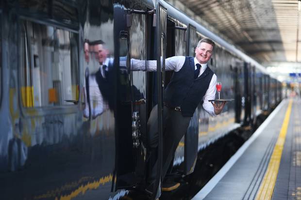 Mark Donegan waits for the first customers to board the Belmond Grand Hibernian at Heuston Station. Photo: Leon Farrell/Photocall Ireland.