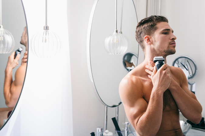 Man With Electric Shaver