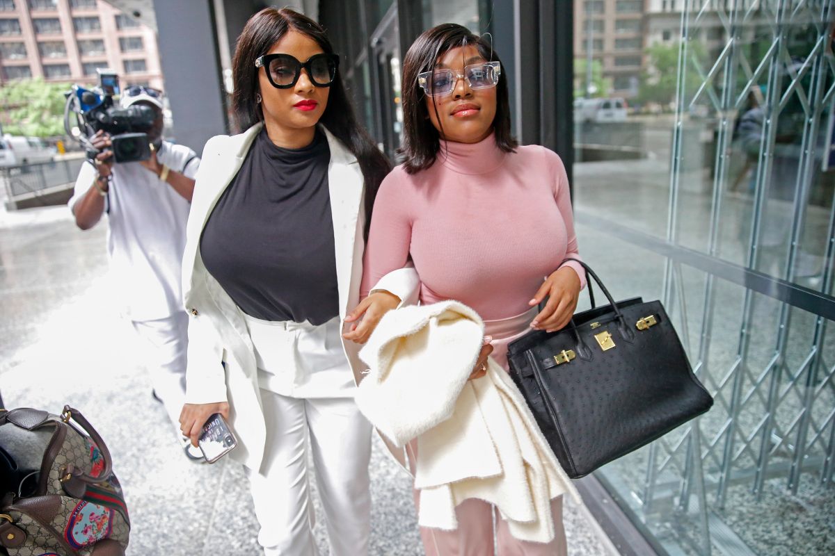 Supporters of singer R. Kelly, Azriel Clary and Joycelyn Savage, leave after the singer's arraignment at the Dirksen Federal Building on July 16, 2019 in Chicago, Illinois. (Photo by Nuccio DiNuzzo/Getty Images)