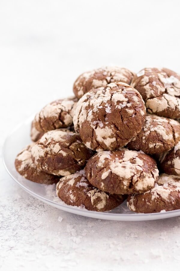 Stack of chocolate crinkle cookies.