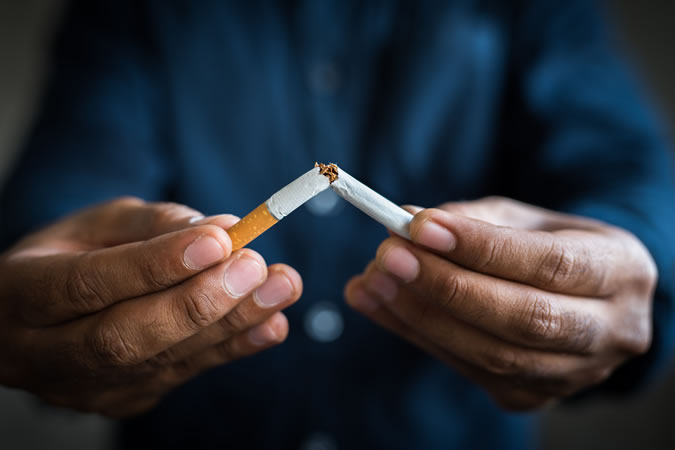 Quitting smoking will help slow hair loss