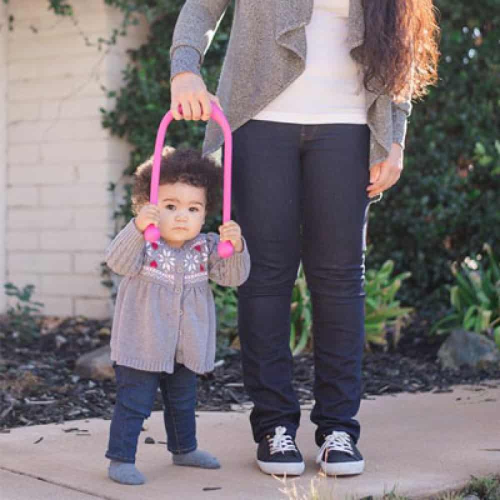 mom using tot 2 walk with toddler