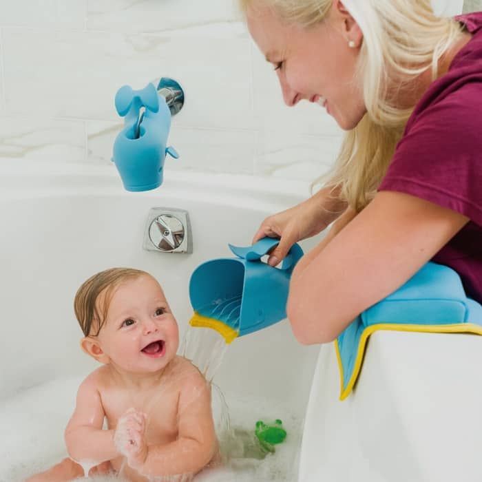 baby in bath with skip hop rinser