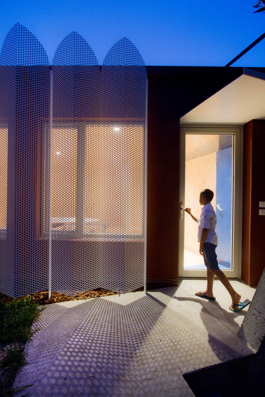 Urban Cabin by Francesca Perani perforated metal facade