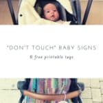 baby with sign not to touch